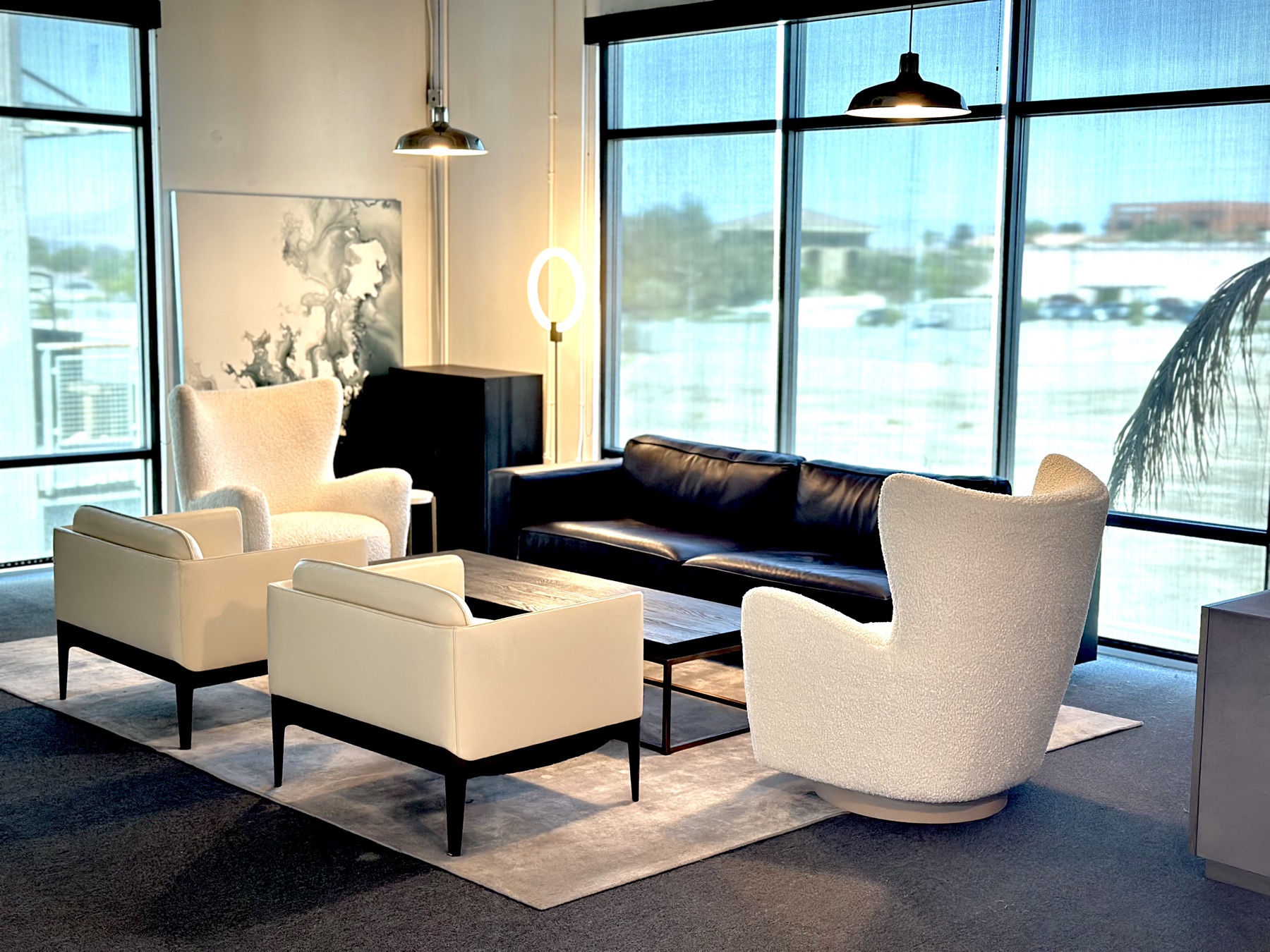 Loft corner with seating, props and natural light bay.